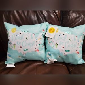 Pair of Sun Squad Outdoor Pillows "Coast to Coast"